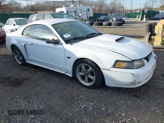 2003 Ford Mustang GT Deluxe with VIN 1FAFP42X03F309689, listed as a IAAI auction lot 41360816 with 999,999 mi miles. Bid and sale history available at carsss.com. Image 1.