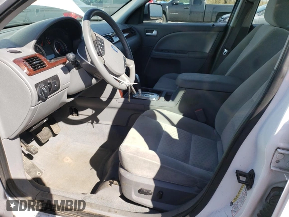 2005 Ford Five Hundred SEL z VIN 1FAFP24135G107018, wystawiony jako Copart lot #48006305 z przebiegiem 113 760 mil mil oraz Szkoda całkowita • Salvage title. Historia ofert i sprzedaży dostępna na DreamBid. Obrazek 7.