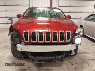 2015 Jeep Cherokee Latitude with VIN 1C4PJMCB4FW687618, listed as a IAAI auction lot 41945132 with 264,782 mi miles and . Bid and sale history available at carsss.com. Image 6.