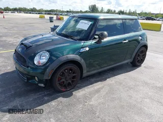 2007 MINI Hardtop S with VIN WMWMF73507TV30183, listed as a IAAI auction lot 42574374 with 90,334 mi miles and . Bid and sale history available at DreamBid. Image 2.