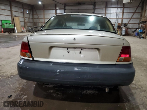 1998 Saturn SL with VIN 1G8ZH5284WZ283758, listed as a Copart auction lot 51630555 with 200,690 mi miles and Salvage title. Bid and sale history available at DreamBid. Image 6.