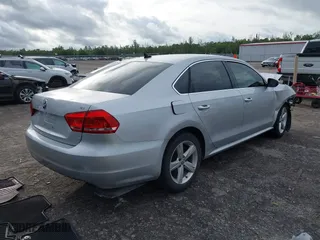 2012 Volkswagen Passat SE with VIN 1VWBP7A38CC074580, listed as a IAAI auction lot 40556967 with 158,525 mi miles. Bid and sale history available at carsss.com. Image 4.