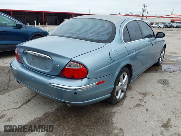 2003 Jaguar S-Type with VIN SAJEA01U33HM70079, listed as a IAAI auction lot 41939388 with 147,975 mi miles and . Bid and sale history available at DreamBid. Image 4.