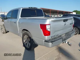 2018 Nissan Titan SV with VIN 1N6AA1E62JN502207, listed as a IAAI auction lot 41996558 with 133,051 mi miles and . Bid and sale history available at DreamBid. Image 3.