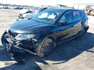 2017 Nissan Rogue SV with VIN KNMAT2MV0HP563632, listed as a IAAI auction lot 41827113 with 193,323 mi miles and . Bid and sale history available at carsss.com. Image 2.