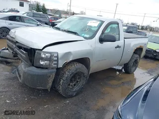 2011 Chevrolet Silverado 1500 Work Truck with VIN 1GCNKPEX8BZ243133, listed as a IAAI auction lot 41796052 with 123,709 mi miles. Bid and sale history available at carsss.com. Image 2.