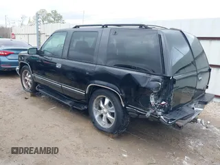 1998 GMC Yukon with VIN 1GKEC13R8WJ711255, listed as a IAAI auction lot 41457304 with 291,211 mi miles. Bid and sale history available at carsss.com. Image 3.