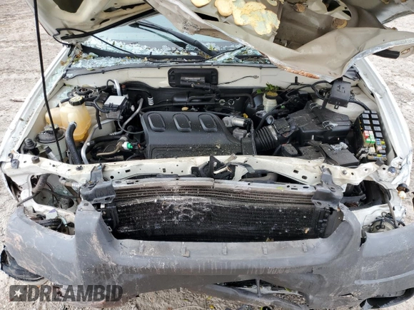 2004 Ford Escape XLS with VIN 1FMYU02144DA18217, listed as a Copart auction lot 43136895 with 135,424 mi miles and Salvage Title. Bid and sale history available at DreamBid. Image 12.