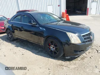 2009 Cadillac CTS RWD w/1SA with VIN 1G6DF577390128796, listed as a IAAI auction lot 42078153 with 257,757 mi miles. Bid and sale history available at carsss.com. Image 1.