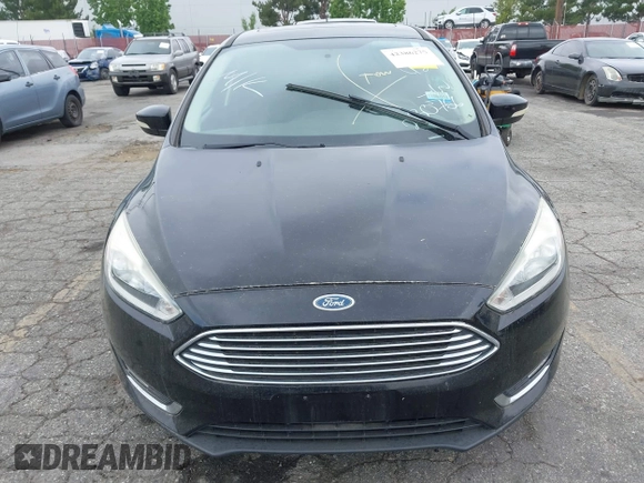 2017 Ford Focus Titanium with VIN 1FADP3N2XHL230766, listed as a IAAI auction lot 42386275 with 64,138 mi miles and . Bid and sale history available at DreamBid. Image 12.