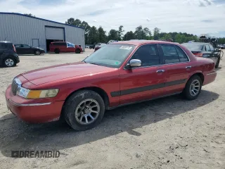 2000 Mercury Grand Marquis GS z VIN 2MEFM74W3YX679702, wystawiony jako Copart lot #58058175 z przebiegiem 161 245 mil mil oraz Szkoda całkowita • Salvage title. Historia ofert i sprzedaży dostępna na DreamBid. Obrazek 1.
