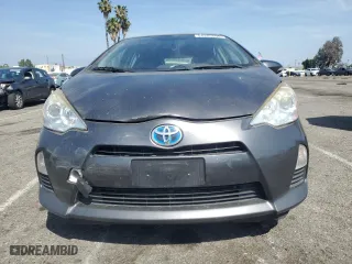 2014 Toyota Prius c One with VIN JTDKDTB34E1573233, listed as a Copart auction lot 54385895 with 107,094 mi miles and Clean Title. Bid and sale history available at carsss.com. Image 5.