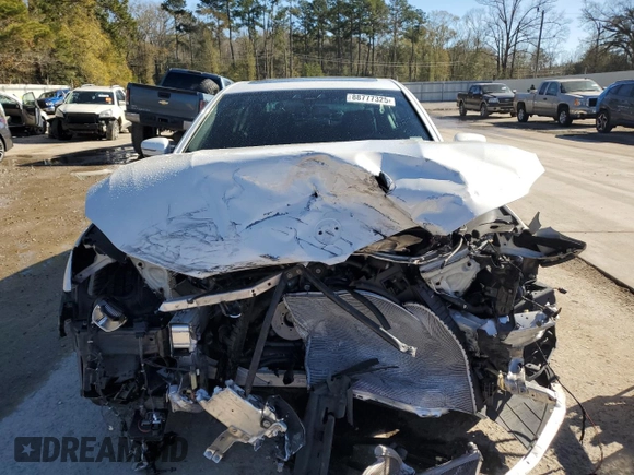 2018 BMW 7 Series 740i with VIN WBA7E2C59JG743247, listed as a Copart auction lot 88777325 with 69,071 mi miles and Salvage Title. Bid and sale history available at carsss.com. Image 5.