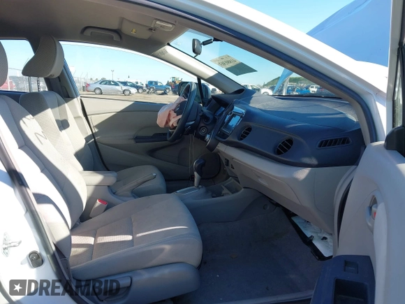 2010 Honda Insight EX with VIN JHMZE2H79AS039292, listed as a IAAI auction lot 41880303 with Not Provided miles and . Bid and sale history available at DreamBid. Image 5.