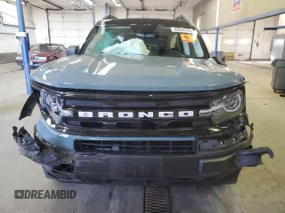 2022 Ford Bronco Sport Outer Banks z VIN 3FMCR9C60NRE06595, wystawiony jako Copart lot #49254795 z przebiegiem 20 947 mil mil oraz Szkoda całkowita • Salvage title. Historia ofert i sprzedaży dostępna na DreamBid. Obrazek 5.