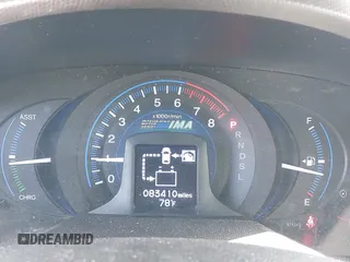 2012 Honda Insight LX with VIN JHMZE2H54CS004368, listed as a IAAI auction lot 42336248 with 83,410 mi miles and . Bid and sale history available at DreamBid. Image 7.