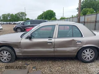 2004 Ford Crown Victoria LX с VIN 2FAFP74W74X114961, выставлен на аукционе IAAI как лот 42347867 с пробегом 170 867 миль миль и . История ставок и продаж доступна на DreamBid. Изображение 14.