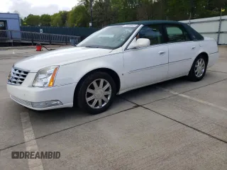 2006 Cadillac DTS 1SD z VIN 1G6KD57Y86U146074, wystawiony jako Copart lot #52917235 z przebiegiem 133 956 mil mil oraz Tytuł czysty. Historia ofert i sprzedaży dostępna na DreamBid. Obrazek 1.