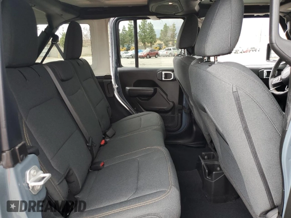 2024 Jeep Wrangler Sport S with VIN 1C4PJXDN4RW124924, listed as a Copart auction lot 50516555 with 7,747 mi miles and Salvage Title. Bid and sale history available at DreamBid. Image 11.