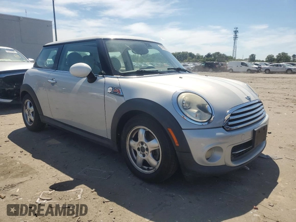 2011 MINI Hardtop with VIN WMWSU3C5XBTX96048, listed as a Copart auction lot 57607955 with 99,632 mi miles and Salvage title. Bid and sale history available at DreamBid. Image 4.