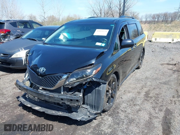 2015 Toyota Sienna SE with VIN 5TDXK3DC4FS581586, listed as a IAAI auction lot 41893274 with 263,577 mi miles. Bid and sale history available at carsss.com. Image 2.