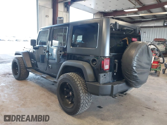 2012 Jeep Wrangler Unlimited Sport with VIN 1C4BJWDG8CL246829, listed as a IAAI auction lot 41816197 with 198,502 mi miles. Bid and sale history available at carsss.com. Image 3.