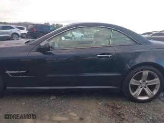 2009 Mercedes-Benz SL-Class V8 with VIN WDBSK71F29F143653, listed as a IAAI auction lot 41310556 with 115,377 mi miles. Bid and sale history available at carsss.com. Image 14.