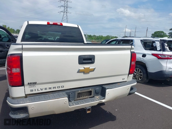 2015 Chevrolet Silverado 1500 LT with VIN 3GCUKREC1FG392218, listed as a IAAI auction lot 42094309 with 140,915 mi miles and . Bid and sale history available at DreamBid. Image 16.