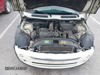 2006 MINI Hardtop with VIN WMWRC33566TK73763, listed as a IAAI auction lot 42782654 with 103,751 mi miles and . Bid and sale history available at DreamBid. Image 10.