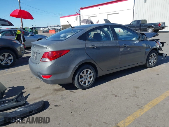 2013 Hyundai Accent GLS z VIN KMHCT4AE1DU542207, wystawiony jako IAAI lot #42174737 z przebiegiem 143 757 mil mil oraz . Historia ofert i sprzedaży dostępna na DreamBid. Obrazek 4.