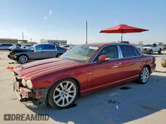 2008 Jaguar XJ with VIN SAJWA79B58SH20211, listed as a Copart auction lot 46951055 with 144,655 mi miles and Salvage Title. Bid and sale history available at carsss.com. Image 1.