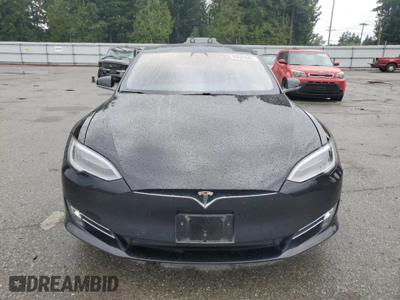 2017 Tesla Model S 100D с VIN 5YJSA1E21HF188840, выставлен на аукционе Copart как лот 62683685 с пробегом 90 101 миль миль и Списание • Salvage title. История ставок и продаж доступна на DreamBid. Изображение 5.