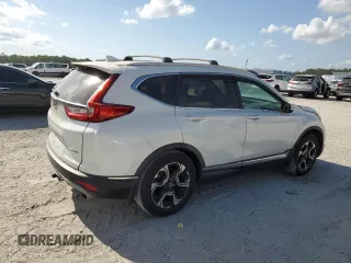 2018 Honda CR-V Touring with VIN 5J6RW1H9XJL010690, listed as a Copart auction lot 53554015 with 90,158 mi miles and Salvage Title. Bid and sale history available at DreamBid. Image 3.
