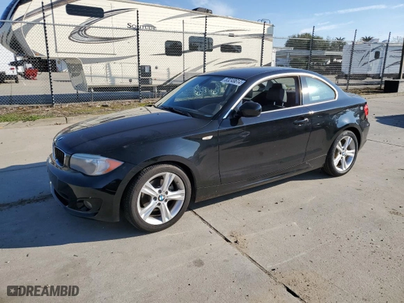 2013 BMW 1 Series 128i with VIN WBAUP9C5XDVS95834, listed as a Copart auction lot 83249614 with 0 mi miles and Salvage Title. Bid and sale history available at carsss.com. Image 1.