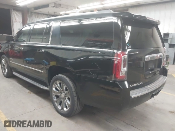 2016 GMC Yukon XL Denali with VIN 1GKS2HKJ8GR102213, listed as a IAAI auction lot 41818737 with 154,607 mi miles and . Bid and sale history available at DreamBid. Image 3.
