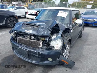 2007 MINI Hardtop S with VIN WMWMF73557TT80376, listed as a IAAI auction lot 42067228 with 174,262 mi miles and . Bid and sale history available at DreamBid. Image 17.