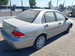2006 Mitsubishi Lancer ES with VIN JA3AJ26E16U005417, listed as a IAAI auction lot 39811143 with 184,925 mi miles. Bid and sale history available at carsss.com. Image 4.