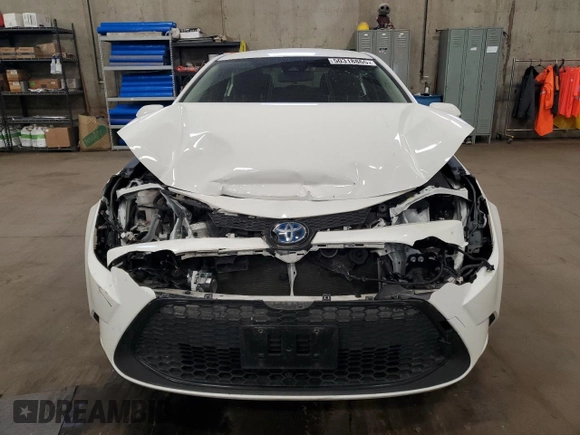 2021 Toyota Corolla Hybrid LE with VIN JTDEAMDE4MJ002382, listed as a Copart auction lot 50318865 with 74,385 mi miles and Salvage Title. Bid and sale history available at carsss.com. Image 5.