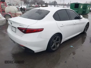 2017 Alfa Romeo Giulia with VIN ZARFAEBN5H7540188, listed as a IAAI auction lot 41619098 with 106,512 mi miles. Bid and sale history available at carsss.com. Image 4.