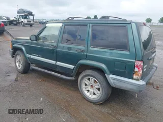 2000 Jeep Cherokee with VIN 1J4FT48S4YL240347, listed as a IAAI auction lot 42361311 with Not provided miles and . Bid and sale history available at DreamBid. Image 3.