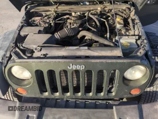 2008 Jeep Wrangler Unlimited X with VIN 1J4GA39108L509275, listed as a Copart auction lot 52386455 with 220,829 mi miles and Salvage Title. Bid and sale history available at carsss.com. Image 12.
