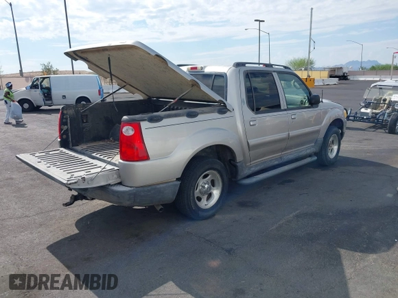 2004 Ford Explorer Sport Trac XLS z VIN 1FMZU77K64UB93602, wystawiony jako IAAI lot #42737380 z przebiegiem 224 488 mil mil oraz . Historia ofert i sprzedaży dostępna na DreamBid. Obrazek 4.
