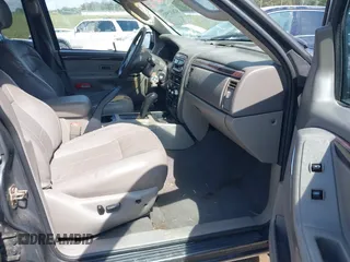 2002 Jeep Grand Cherokee Limited with VIN 1J4GW58J02C163931, listed as a IAAI auction lot 42632552 with 228,955 mi miles and . Bid and sale history available at DreamBid. Image 5.