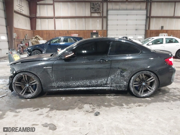 2018 BMW M2 with VIN WBS1J5C56JVD36919, listed as a IAAI auction lot 41587121 with 46,356 mi miles. Bid and sale history available at carsss.com. Image 14.