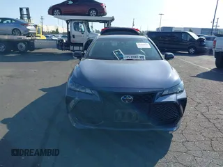 2019 Toyota Avalon XLE z VIN 4T1BZ1FB5KU030812, wystawiony jako IAAI lot #41498998 z przebiegiem 31 986 mil mil oraz . Historia ofert i sprzedaży dostępna na DreamBid. Obrazek 13.
