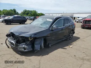 2018 BMW X1 xDrive28i with VIN WBXHT3C36J5F89230, listed as a Copart auction lot 62904545 with 170,860 mi miles and Salvage title. Bid and sale history available at DreamBid. Image 1.