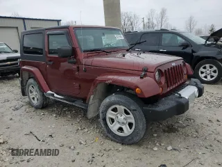 2008 Jeep Wrangler Sahara z VIN 1J4FA54128L561392, wystawiony jako Copart lot #50216865 z przebiegiem 183 825 mil mil oraz Czysty tytuł • Clean title. Historia ofert i sprzedaży dostępna na DreamBid. Obrazek 4.