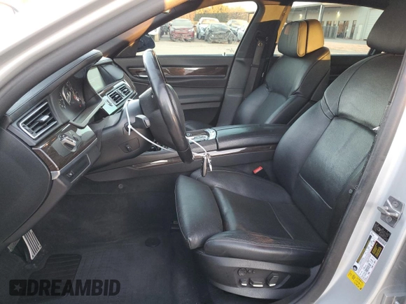 2012 BMW 7 Series 740Li with VIN WBAKB4C50CC576043, listed as a Copart auction lot 42060065 with 142,017 mi miles and Salvage Title. Bid and sale history available at carsss.com. Image 7.