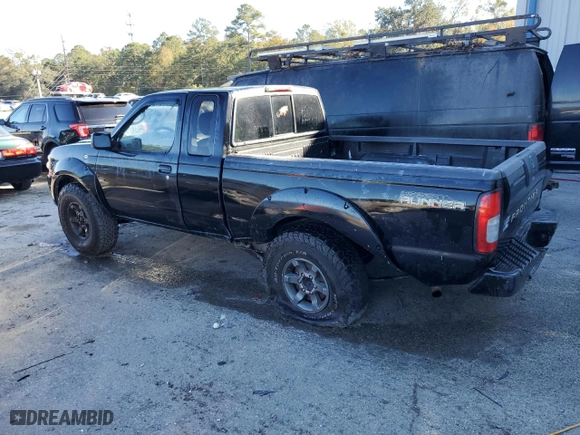 2004 Nissan Frontier 2WD XE Desert Runner with VIN 1N6ED26T44C434897, listed as a Copart auction lot 82699384 with 290,295 mi miles and Salvage Title. Bid and sale history available at carsss.com. Image 2.