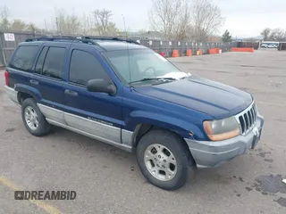 2000 Jeep Grand Cherokee Laredo z VIN 1J4GW48N7YC237965, wystawiony jako IAAI lot #41949633 z przebiegiem 201 082 mil mil oraz . Historia ofert i sprzedaży dostępna na DreamBid. Obrazek 1.